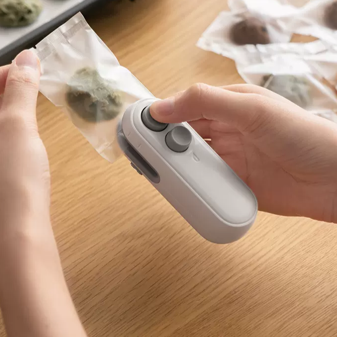 MCOIKY® 2-in-1 Mini Heat Sealer - Seal & Cutter (C)